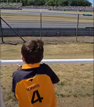 Rudi watches the Formula 1 cars at practice
